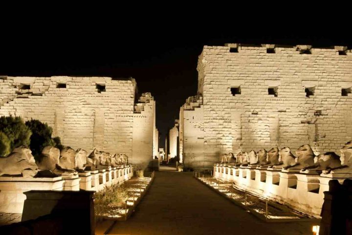 ancient egyptian temple of karnak in luxor lit up at night 1600x828 الأقصر طيران